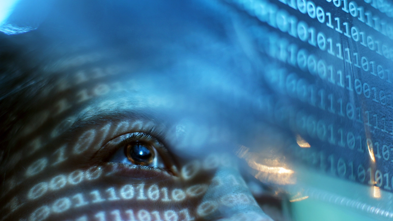 image of an eye with binary code projected on it, from Pew Research Center article 