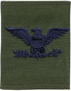 subdued blue colonel's rank insignia