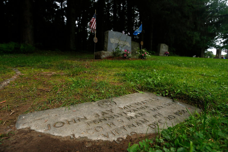 The gravestone of Lance Cpl. John Michaels, in Moscow, Penn. Niko J. Kallianiotis for The New York Times