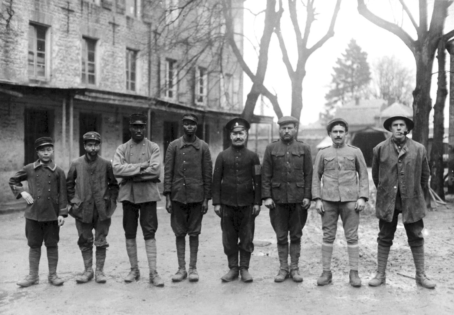 Western front, a group of captured Allied soldiers representing 8 nationalities: Anamite (Vietnamese), Tunisian, Senegalese, Sudanese, Russian, American, Portuguese, and English.