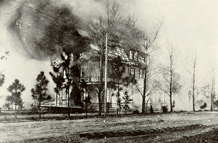 [The Highland Hotel, built in 1901, going up in flames in March 1916.]